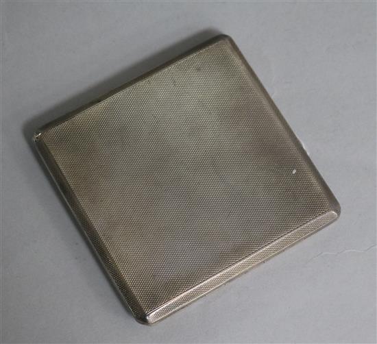 A 1930s engine turned silver slide action cigarette case.